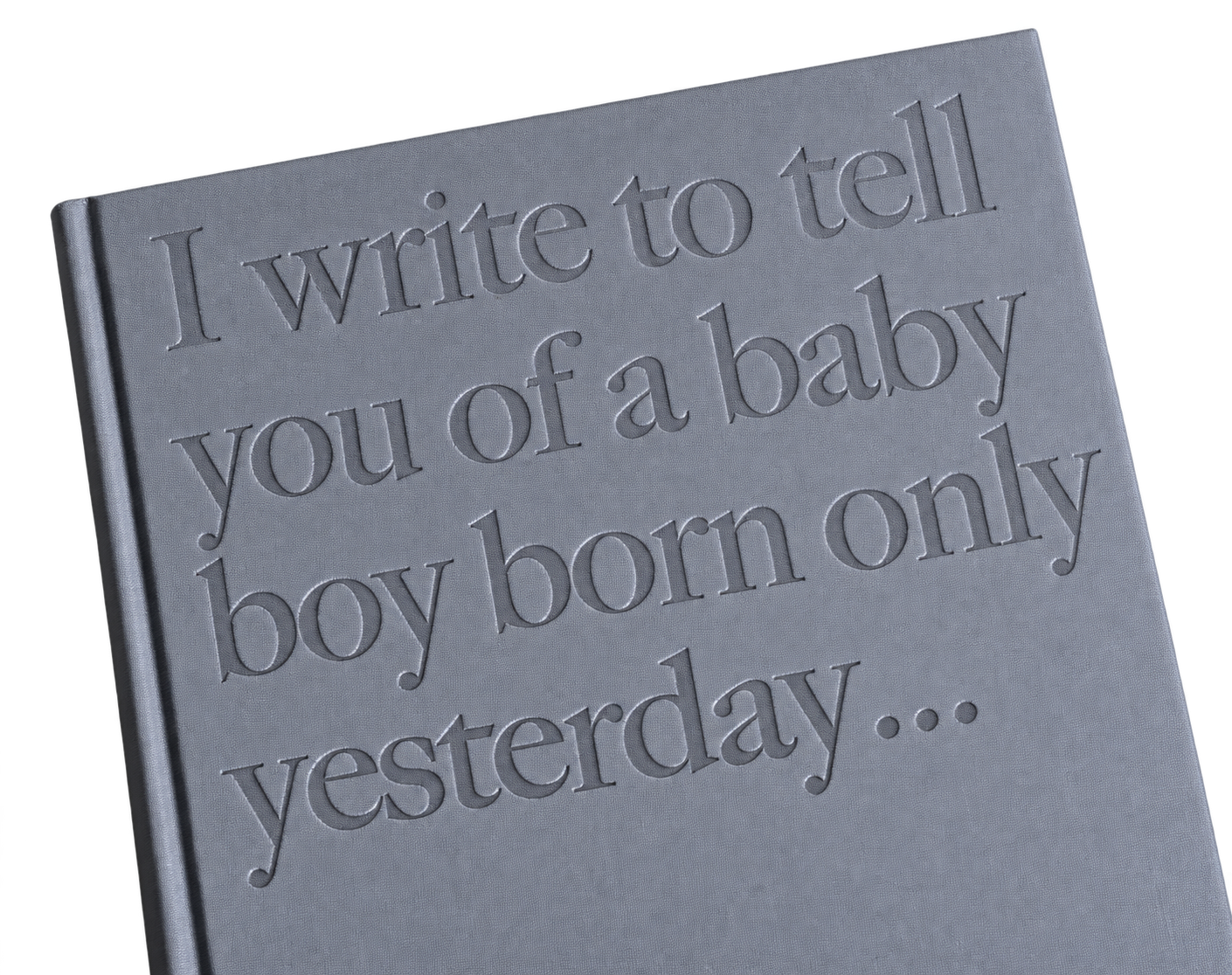 Enhanced presentation of the grey cloth book and its blind-embossed title.